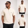 8b1998d4-5f26-4c37-96f5-12fd2606b936 Men’s Interlock Vertical Rib Half-Zip Polo T-Shirt